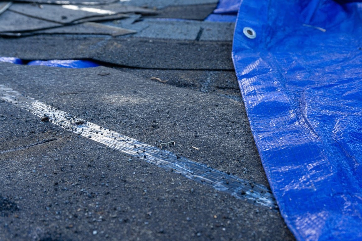 weather damage roof repair service in Indian Mound, TN