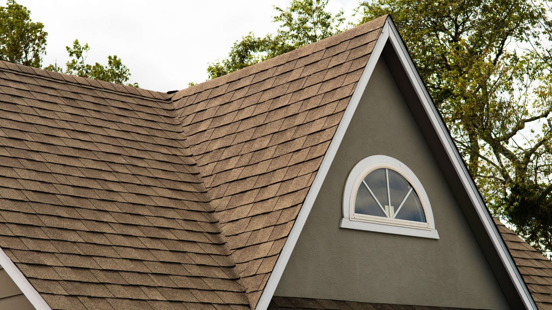 Home with brown shingles on the roof