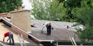 address ponding water on asphalt shingle roofs in Ohio low-slope designs