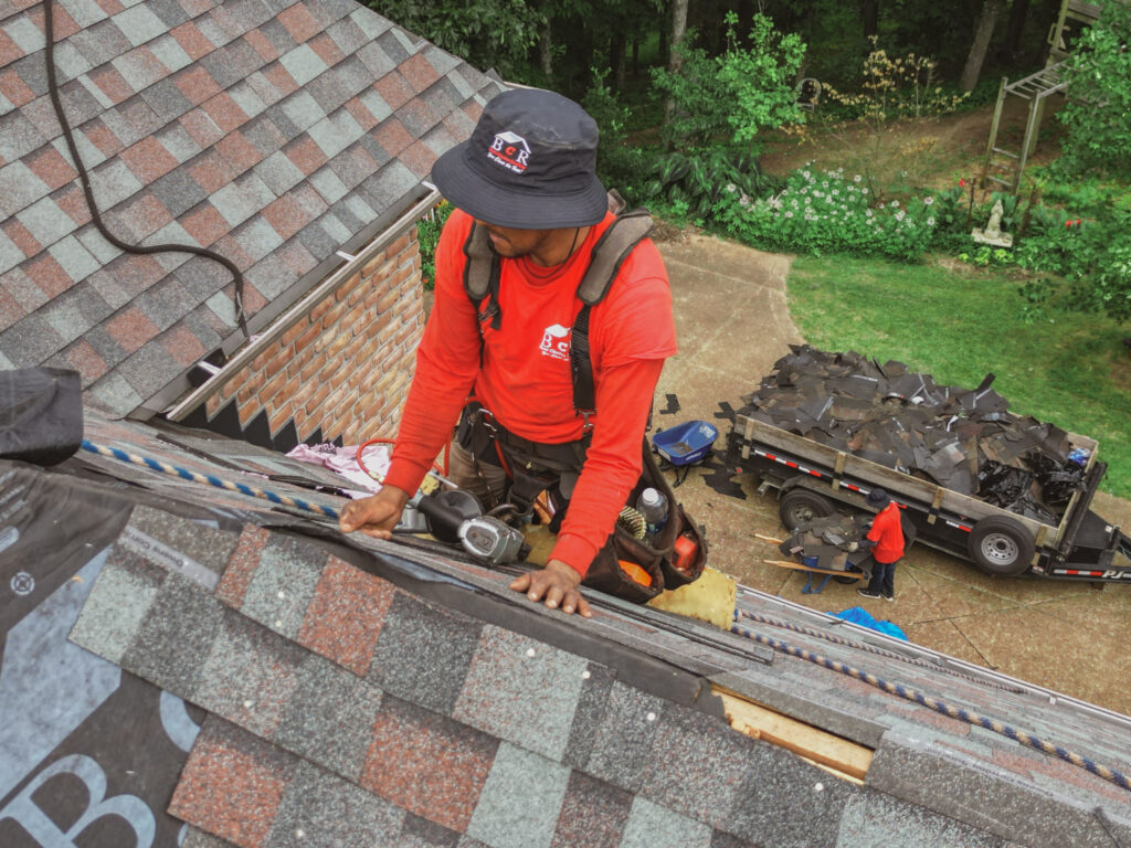 Professional roofing team at work in Hazel Park City, MI