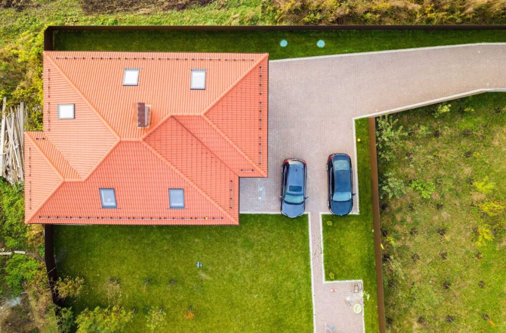 A Best Choice Roofing employee demonstrating the benefits of professional roof replacement in Hamtramck, MI.