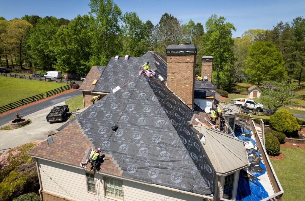 A Best Choice Roofing technician working on a roof replacement, showing the benefits of quality materials for local homeowners.