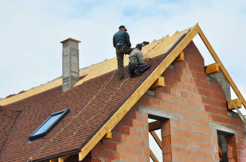 Professional roofers working on a home in Anoka, MN