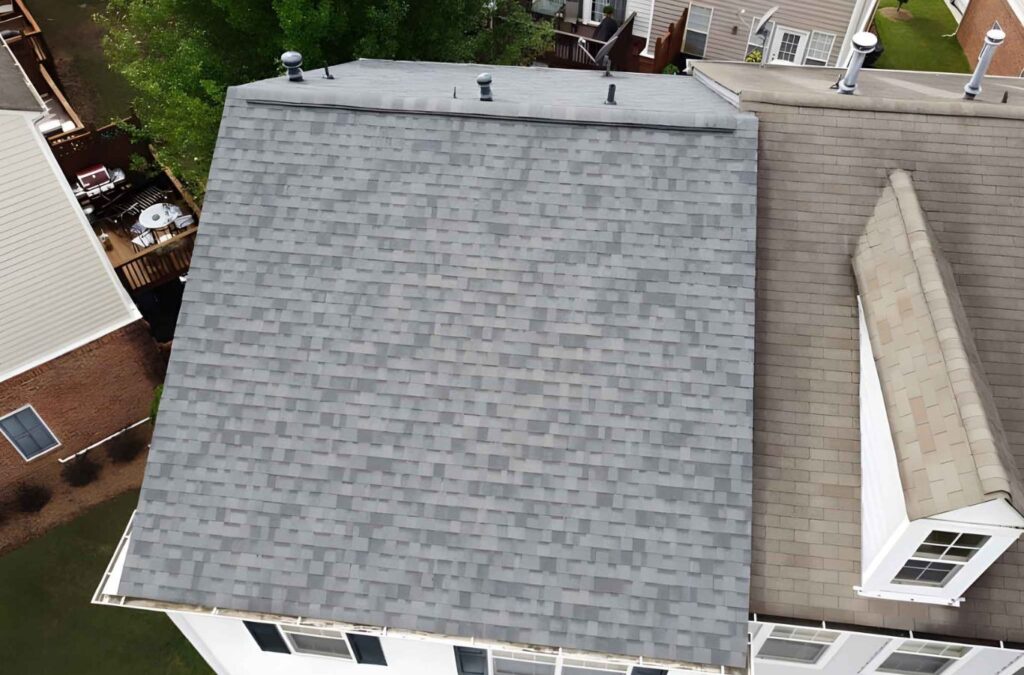 A skilled roofer from Best Choice Roofing fixing a damaged roof in Rochester Hills City, MI, ensuring top-quality service.