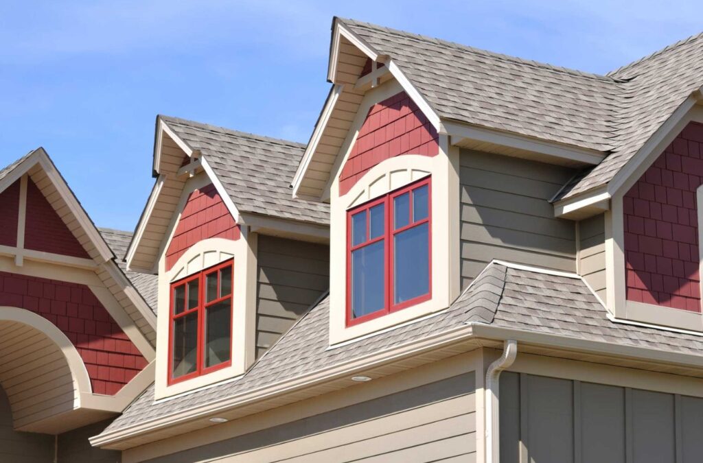 A Best Choice Roofing team member performing a roof inspection in Clinton Township, MI, demonstrating the importance of using a local expert for your roofing needs.