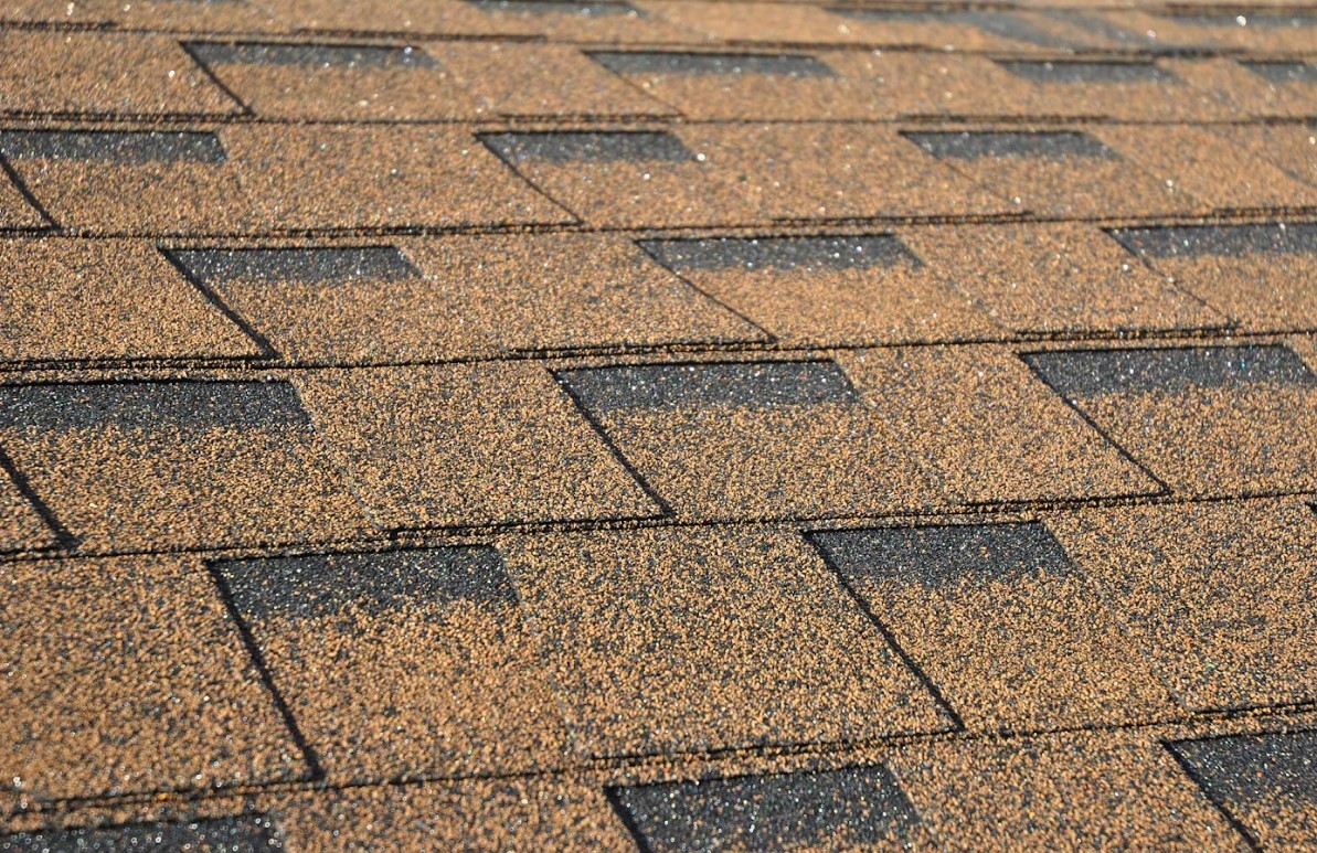 why color fading happens faster on asphalt shingles in Gainesville, FL