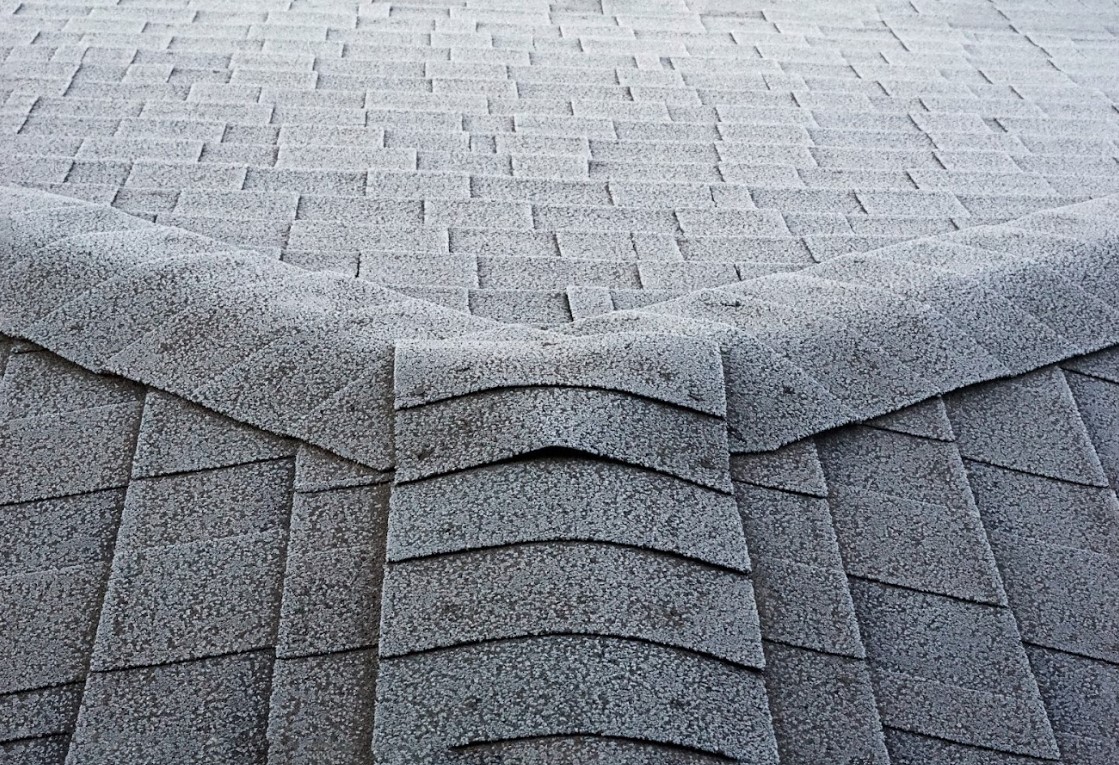 curling in asphalt shingle roofs