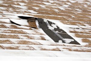 storm damage roof repair in Guthrie